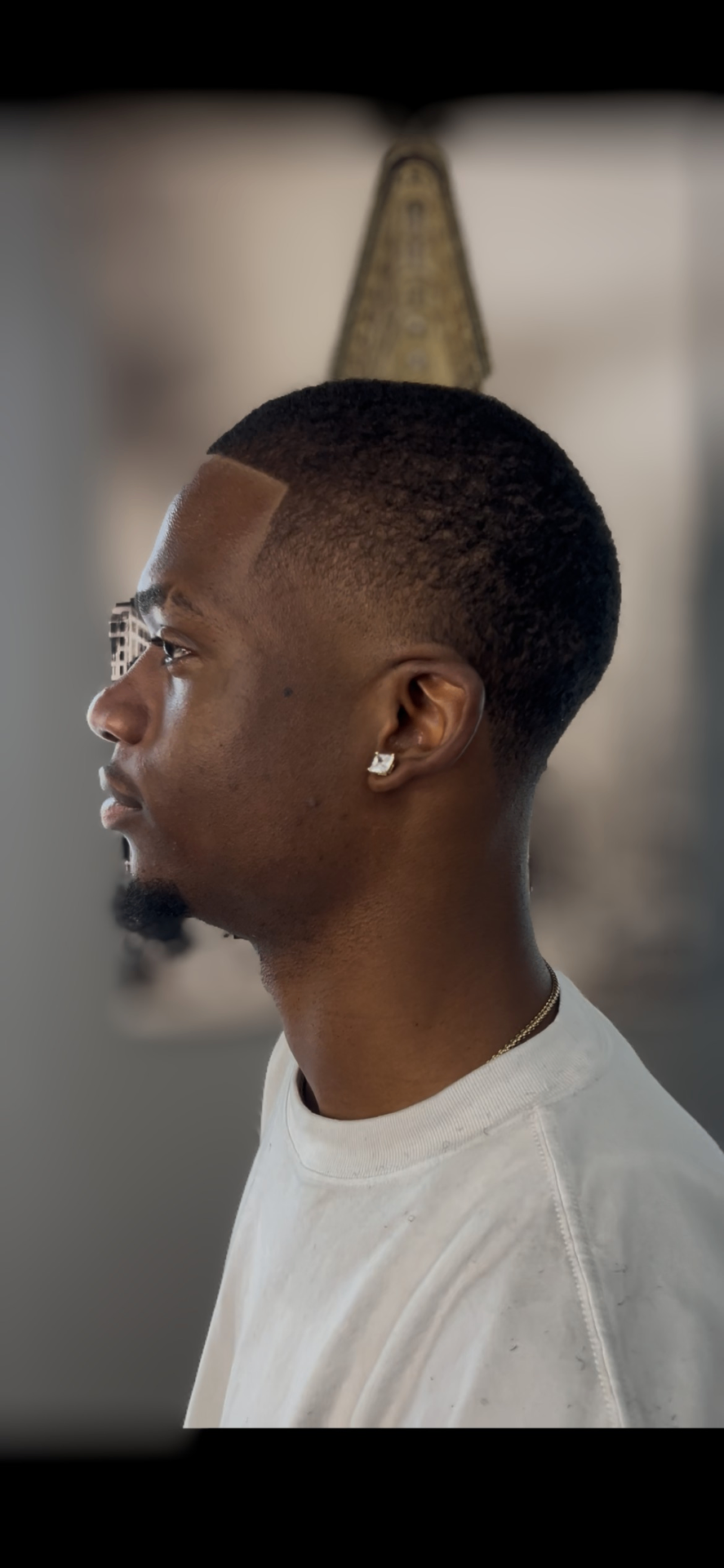 Sharp high-top fade with precise line-up